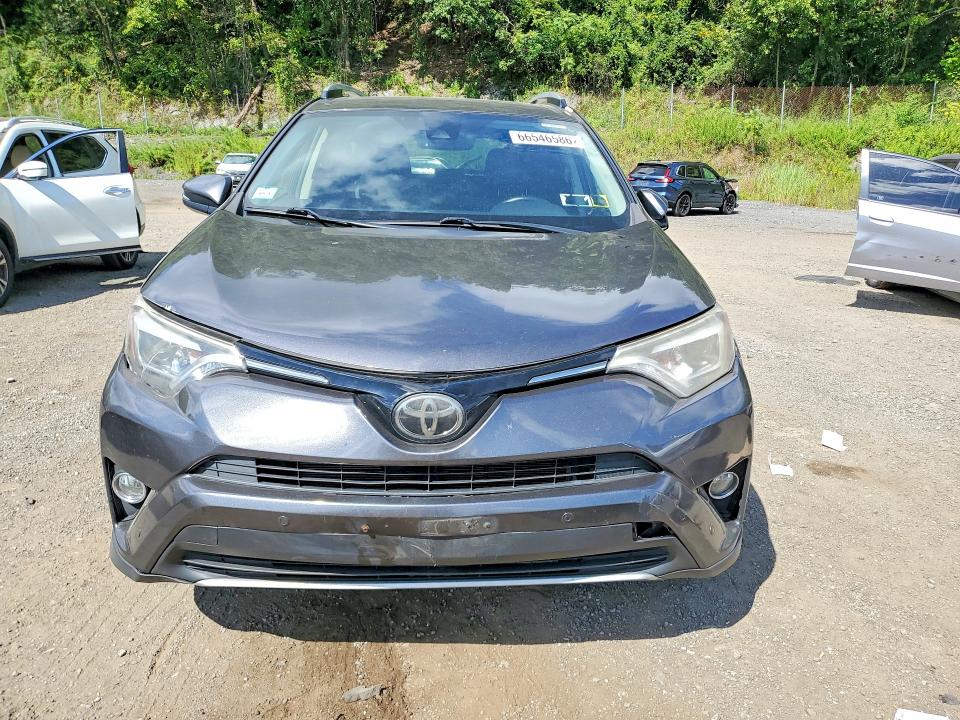 Photo 5 from auction – 2016 TOYOTA RAV4 with VIN JTMDFREV4GJ100308