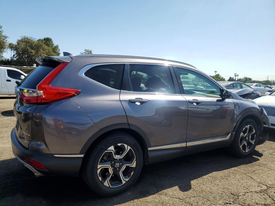 Photo 3 from auction – 2017 HONDA CR-V with VIN 7FARW1H93HE028892