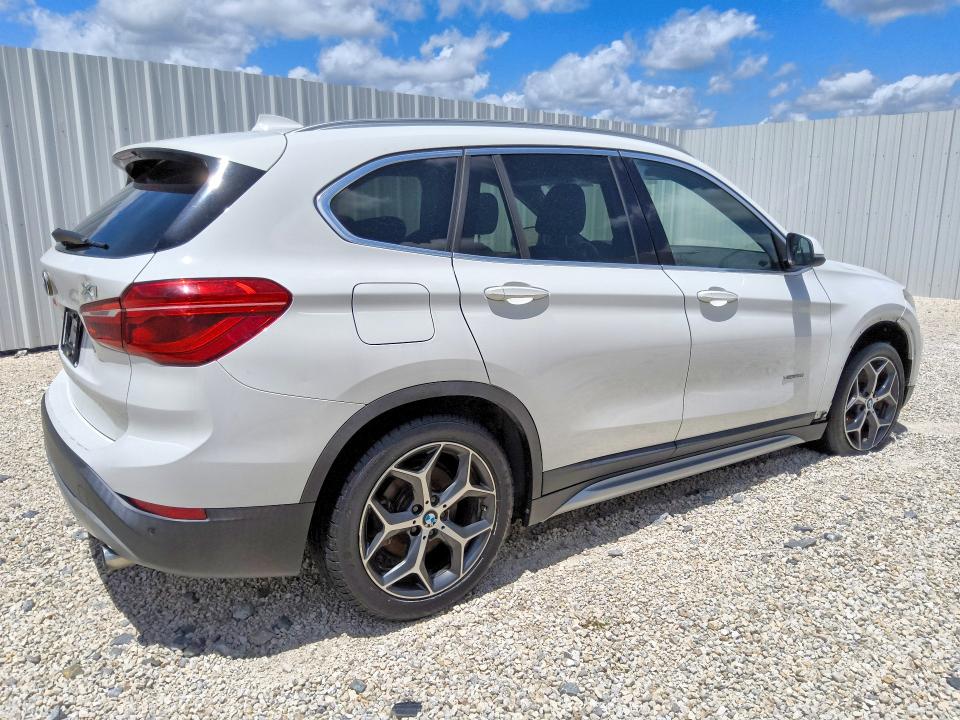 Photo 3 from auction – 2016 BMW X1 with VIN WBXHT3C39G5E52744