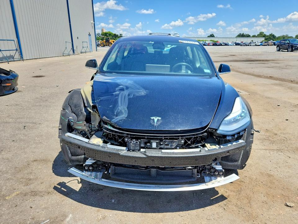 Photo 5 from auction – 2018 TESLA MODEL 3 with VIN 5YJ3E1EB7JF120900