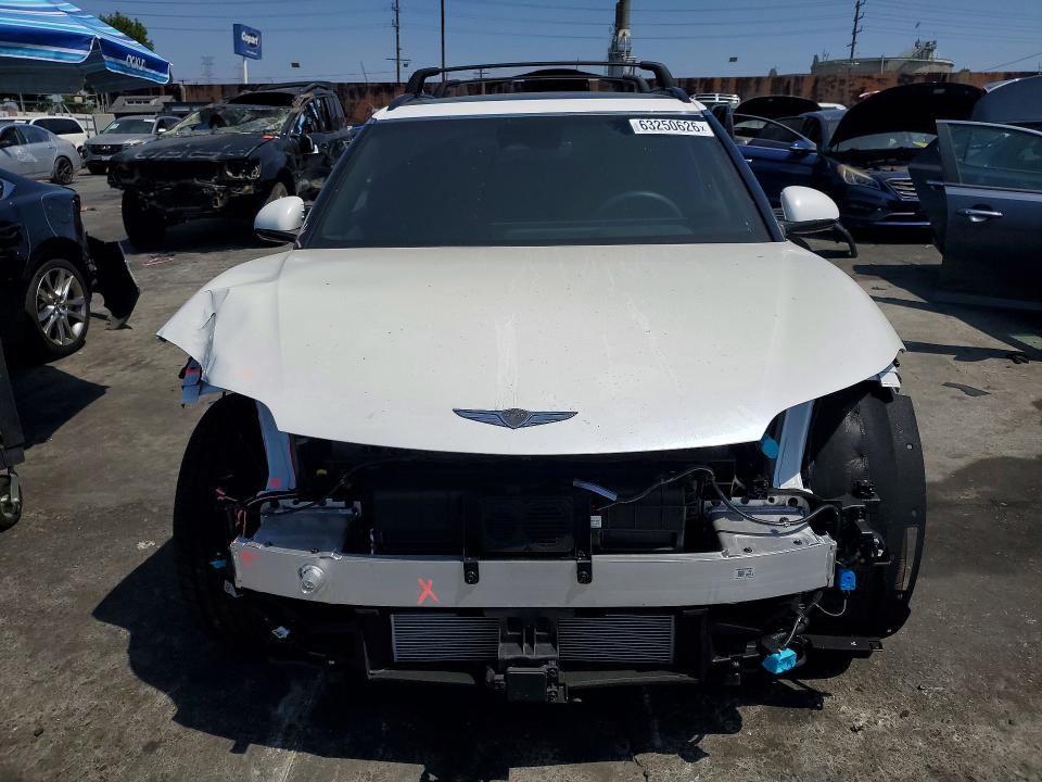 Photo 5 from auction – 2026 GENESIS GV60 with VIN KMUKCDSC4TU031258