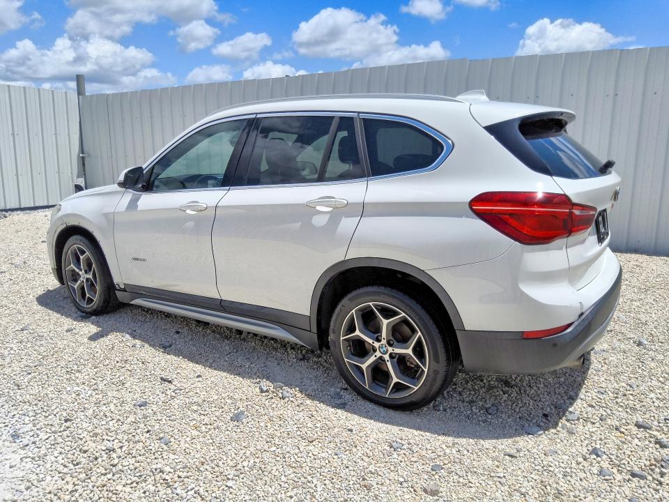 Photo 2 from auction – 2016 BMW X1 with VIN WBXHT3C39G5E52744