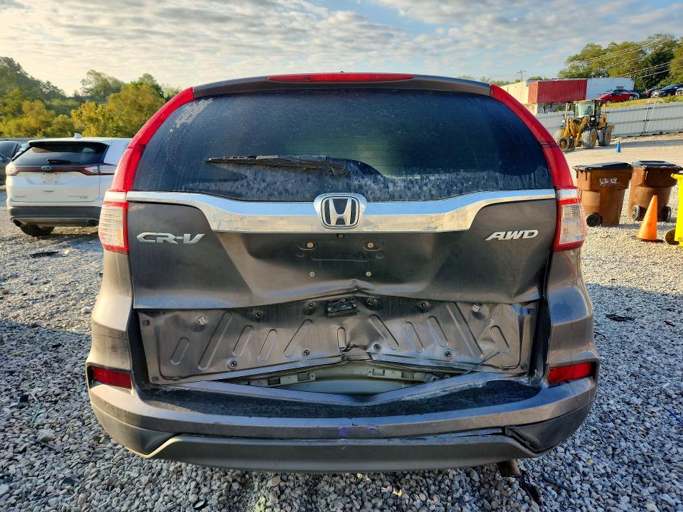 Photo 6 from auction – 2016 HONDA CR-V with VIN 2HKRM4H42GH684217