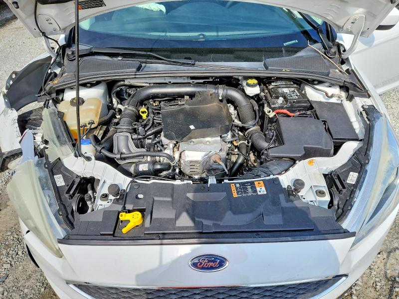 Снимка 11 от търг – 2018 FORD FOCUS с VIN 1FADP3FE8JL322800