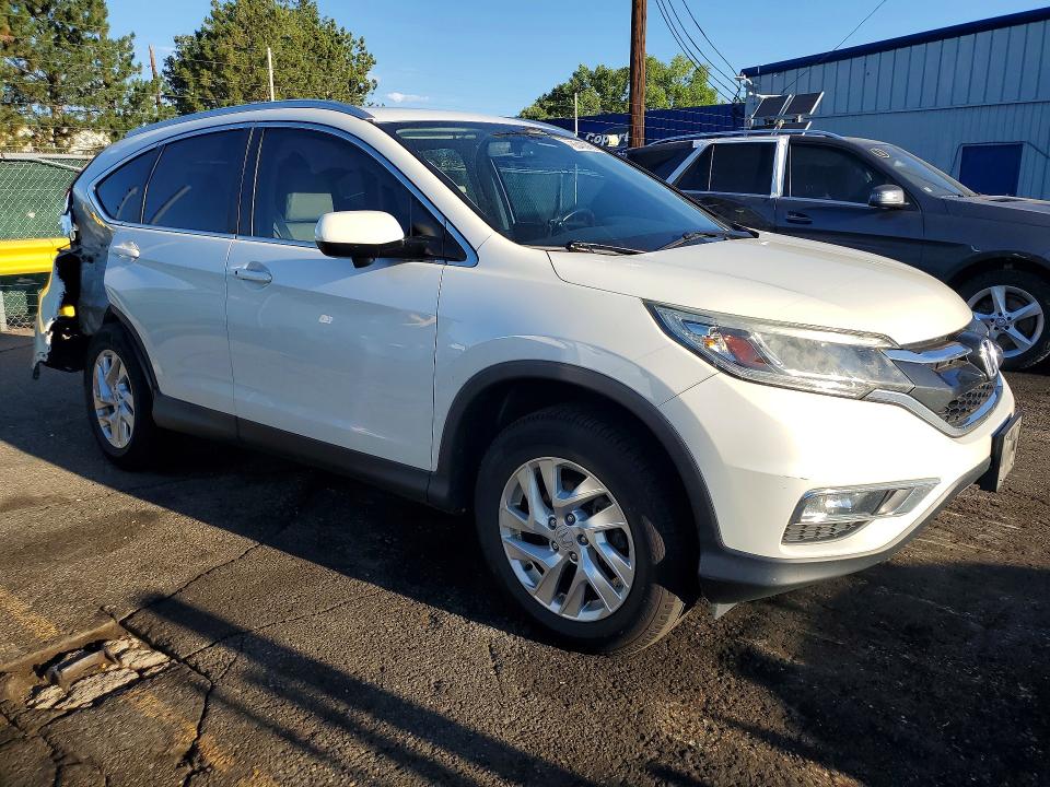 Photo 4 from auction – 2015 HONDA CR-V with VIN 5J6RM4H72FL064157