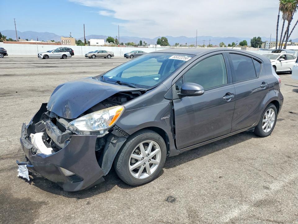 TOYOTA PRIUS C 2014 with VIN JTDKDTB34E1570042 - Photo from auction