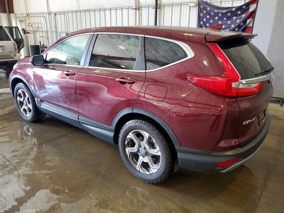 Photo 2 from auction – 2018 HONDA CR-V with VIN 7FARW2H81JE024424