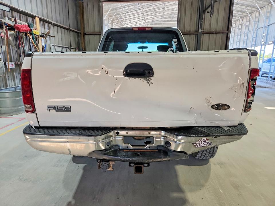 Photo 6 from auction – 2002 FORD F150 with VIN 1FTRX18L72NA83360