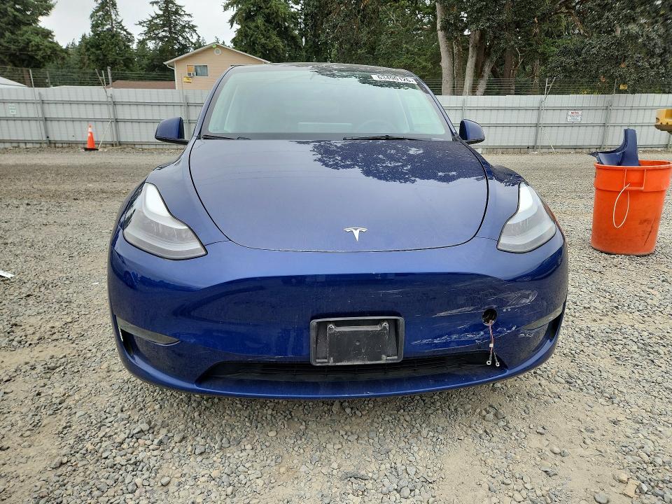 Photo 5 from auction – 2023 TESLA MODEL Y with VIN 7SAYGAEEXPF777194