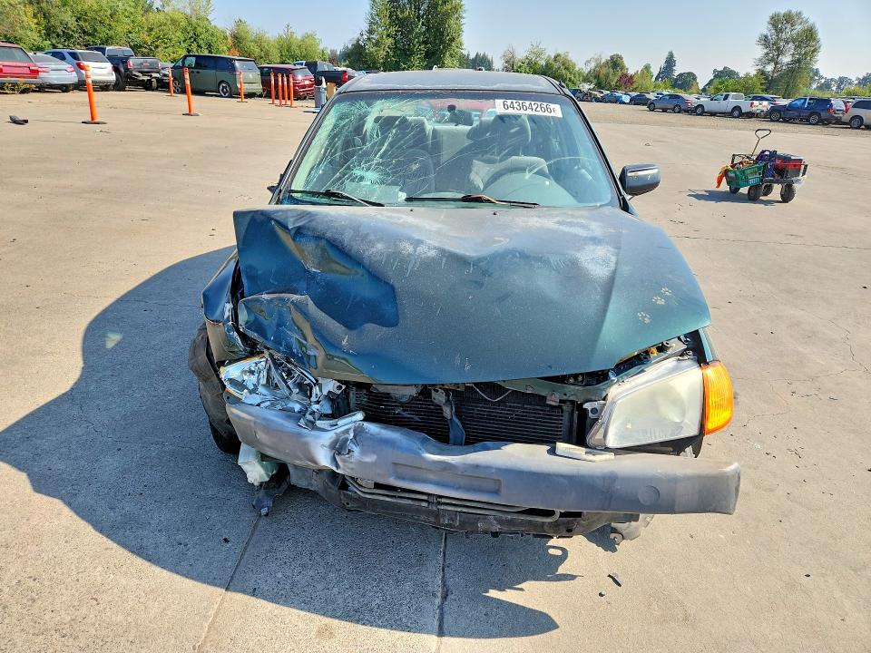 Photo 5 from auction – 1999 MAZDA PROTEGE with VIN JM1BJ2228X0132384