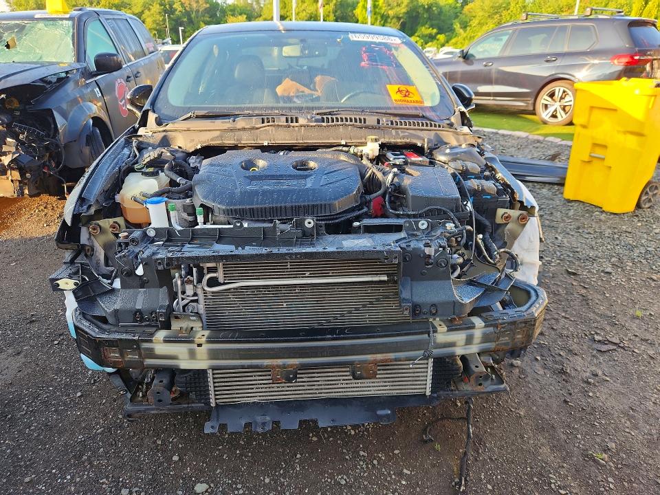 Photo 5 from auction – 2017 FORD FUSION with VIN 3FA6P0T91HR185340