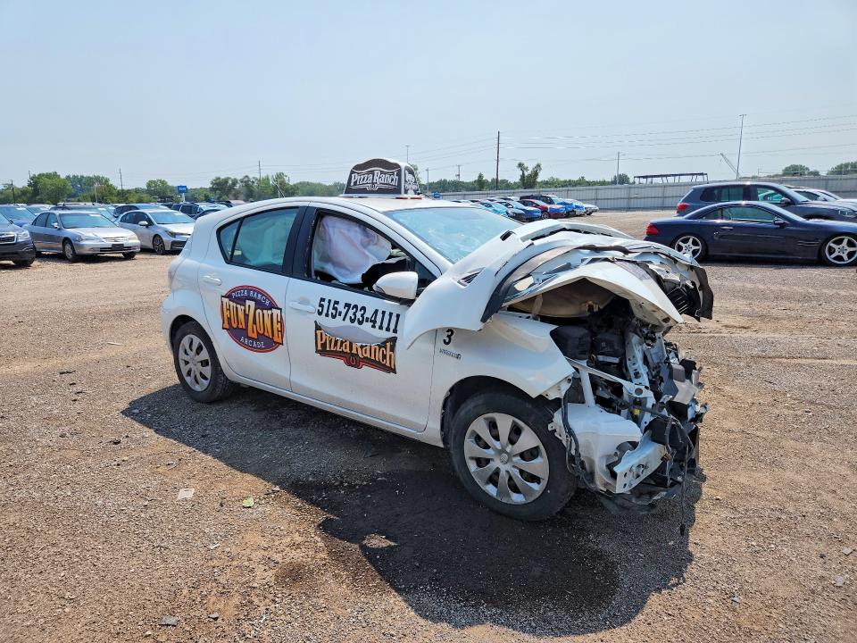 Photo 4 from auction – 2014 TOYOTA PRIUS C with VIN JTDKDTB35E1069578