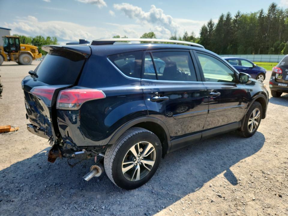 Photo 3 from auction – 2017 TOYOTA RAV4 with VIN JTMRFREV0HJ171111