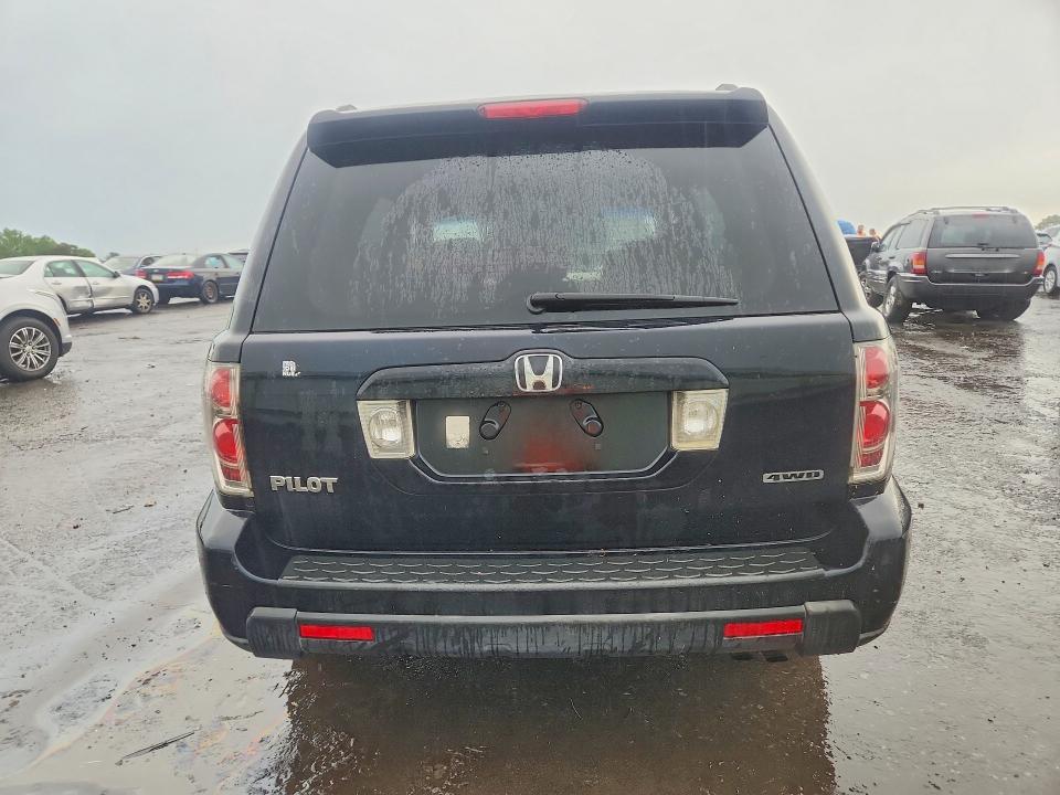 Photo 6 from auction – 2006 HONDA PILOT with VIN 2HKYF18406H563883
