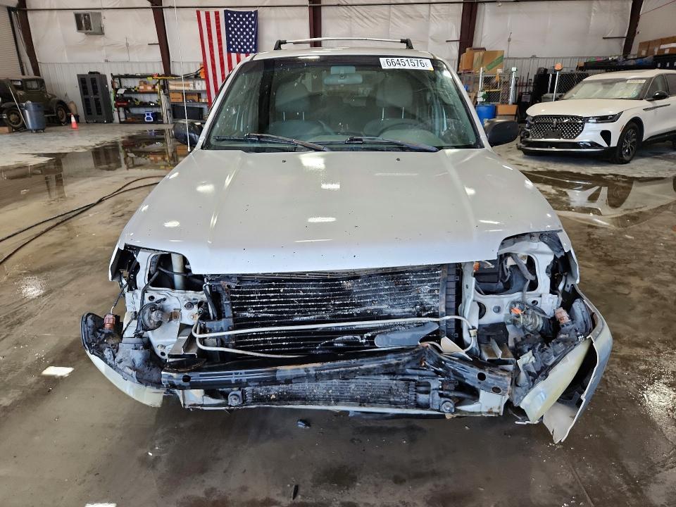 Photo 5 from auction – 2002 FORD ESCAPE with VIN 1FMYU04162KB22875
