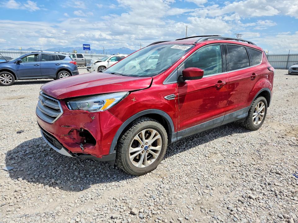 FORD ESCAPE 2018 with VIN 1FMCU9GD8JUB23565 - Photo from auction
