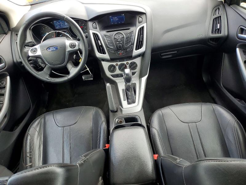 Photo 8 from auction – 2014 FORD FOCUS with VIN 1FADP3F24EL386084