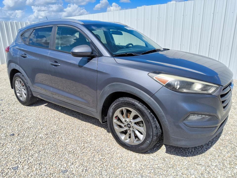 Photo 4 from auction – 2016 HYUNDAI TUCSON with VIN KM8J33A49GU181581