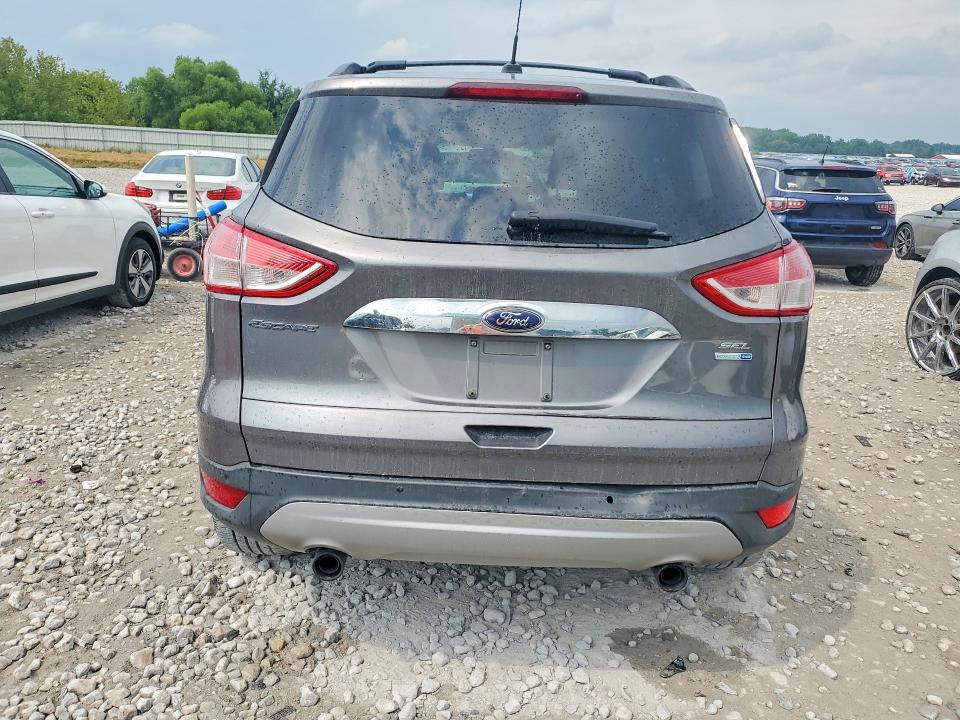 Photo 6 from auction – 2013 FORD ESCAPE with VIN 1FMCU9H96DUA33829