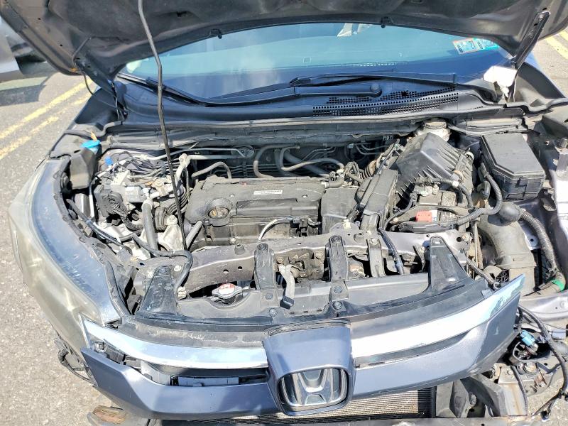 Photo 12 from auction – 2016 HONDA CR-V with VIN 5J6RM4H39GL000695