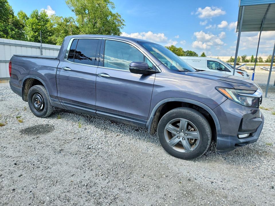 Photo 4 from auction – 2022 HONDA RIDGELINE with VIN 5FPYK3F73NB010654