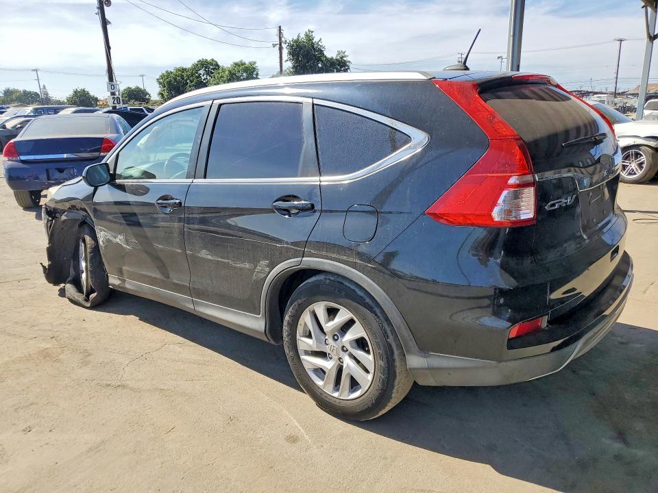 Photo 2 from auction – 2016 HONDA CR-V with VIN 2HKRM3H76GH539931