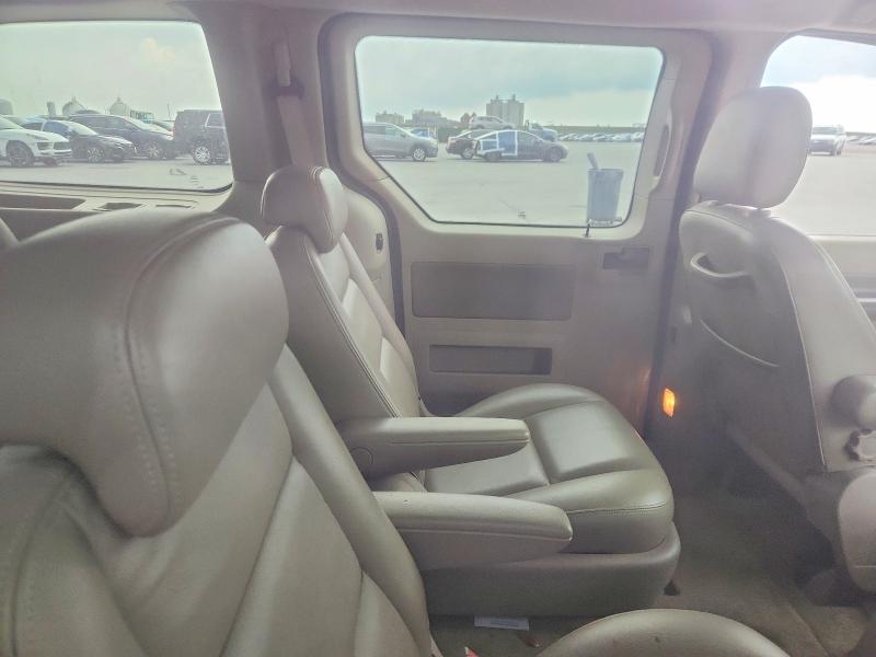Photo 11 from auction – 2004 FORD FREESTAR with VIN 2FMDA52254BA25230