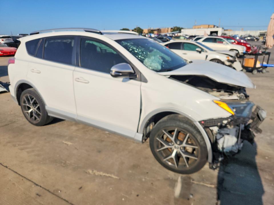 Photo 4 from auction – 2016 TOYOTA RAV4 with VIN JTMNFREV8GD085119