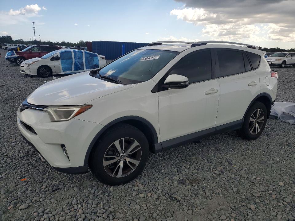 TOYOTA RAV4 2016 with VIN JTMRFREV7GJ090234 - Photo from auction