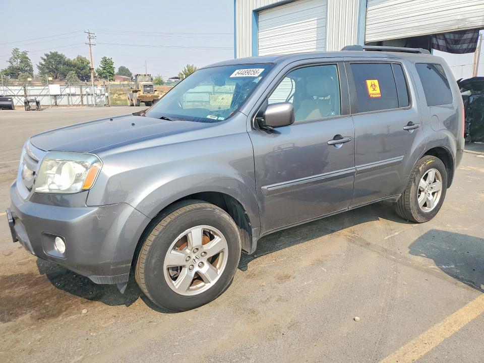 HONDA PILOT 2011 with VIN 5FNYF4H58BB027282 - Photo from auction