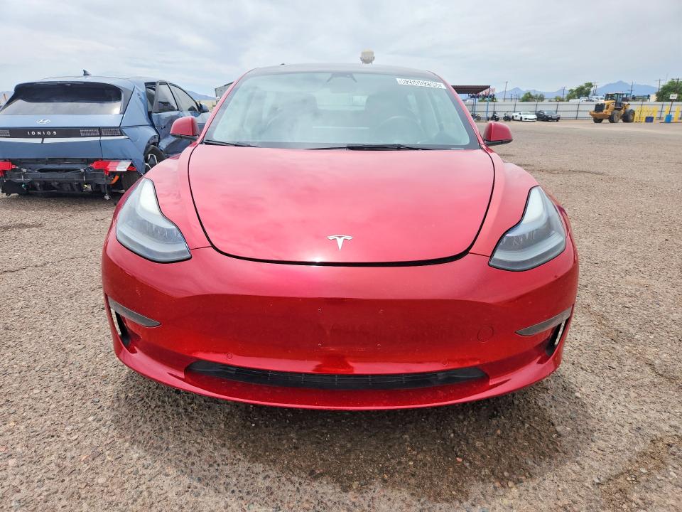 Photo 5 from auction – 2022 TESLA MODEL 3 with VIN 5YJ3E1EA9NF304829