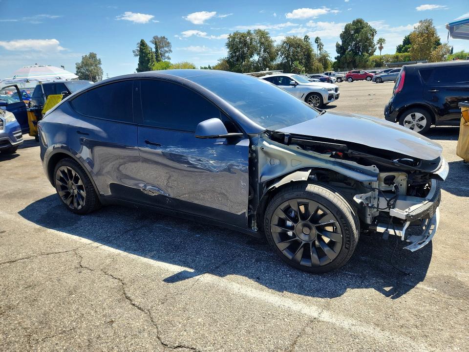 Photo 4 from auction – 2022 TESLA MODEL Y with VIN 7SAYGDEE1NF513828
