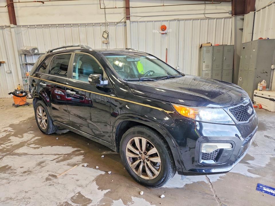 Photo 4 from auction – 2011 KIA SORENTO with VIN 5XYKW4A2XBG092942