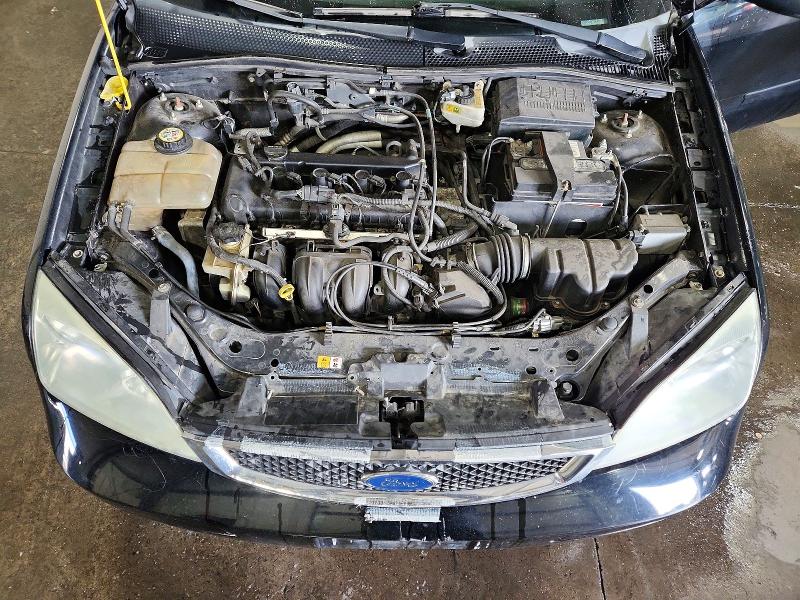 Photo 11 from auction – 2007 FORD FOCUS with VIN 1FAHP31N97W212371