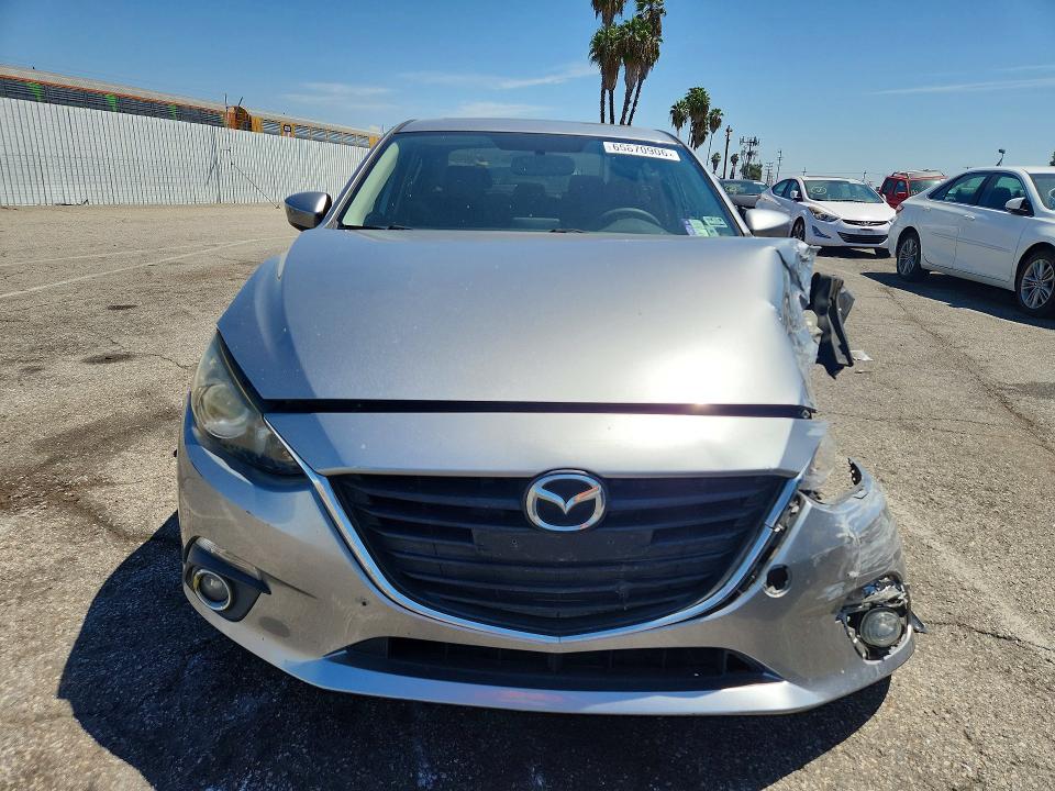 Photo 5 from auction – 2014 MAZDA 3 with VIN JM1BM1W72E1193809