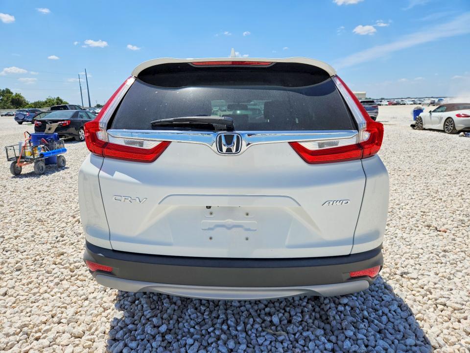 Photo 6 from auction – 2018 HONDA CR-V with VIN 2HKRW2H84JH624593