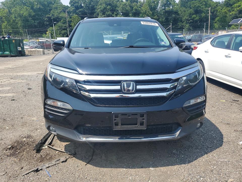 Photo 5 from auction – 2017 HONDA PILOT with VIN 5FNYF6H94HB065180