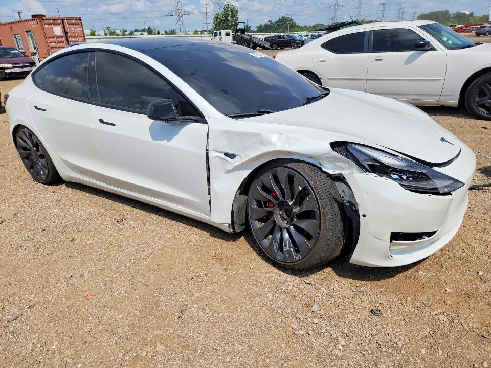 Foto 4 de la subasta – 2021 TESLA MODEL 3 con VIN 5YJ3E1EC3MF984582