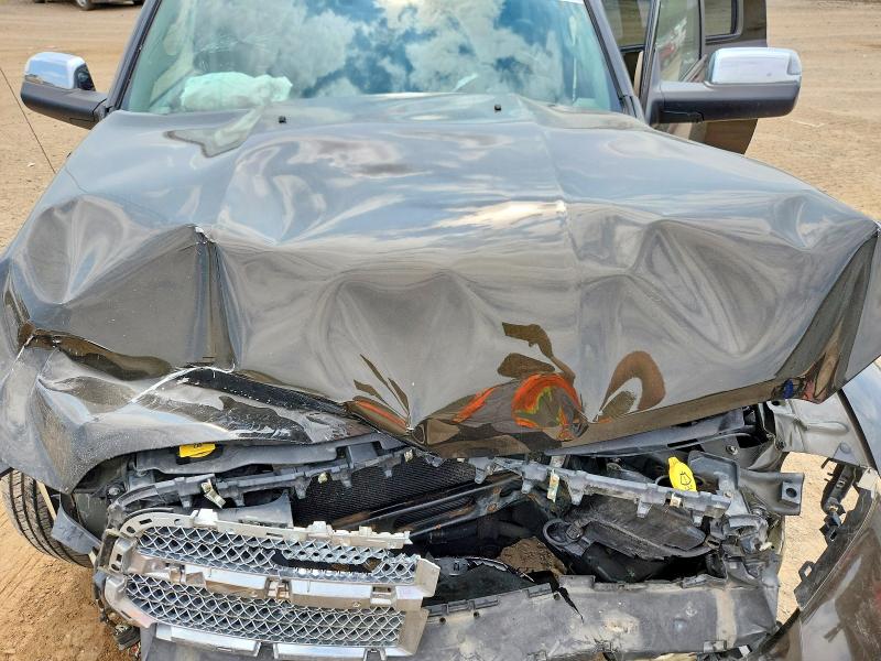 Photo 11 from auction – 2013 RAM 1500 with VIN 1C6RR7PT2DS660760