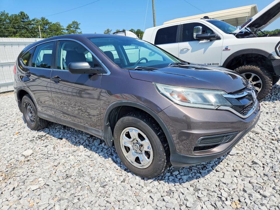 Photo 4 from auction – 2015 HONDA CR-V with VIN 2HKRM3H34FH542032