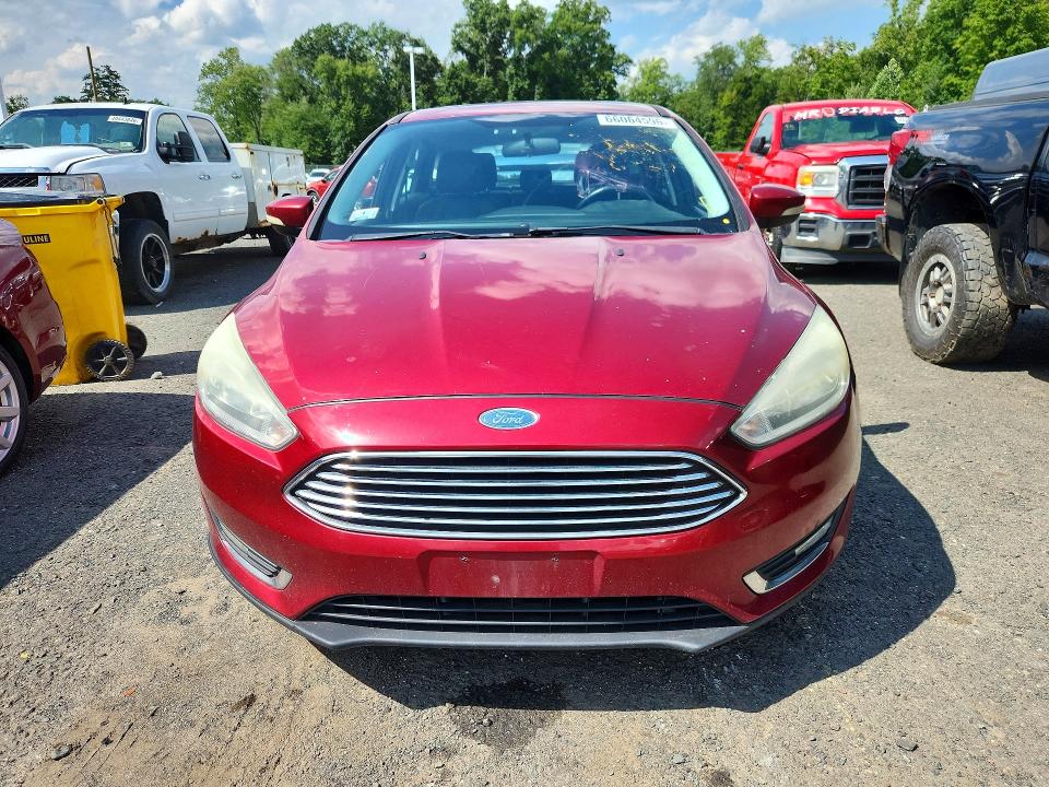 Photo 5 from auction – 2015 FORD FOCUS with VIN 1FADP3N23FL227091