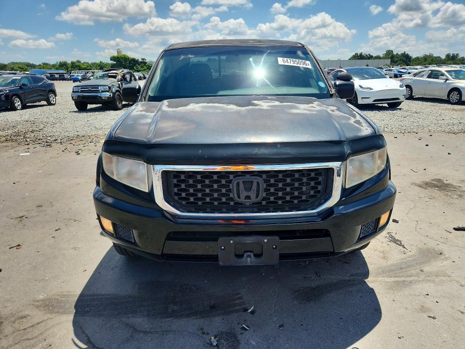 Photo 5 from auction – 2011 HONDA RIDGELINE with VIN 5FPYK1F26BB003704