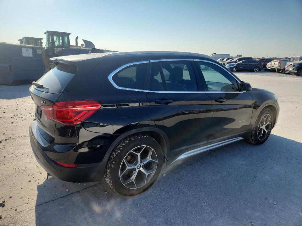 Photo 3 from auction – 2018 BMW X1 with VIN WBXHT3C38J5F91772