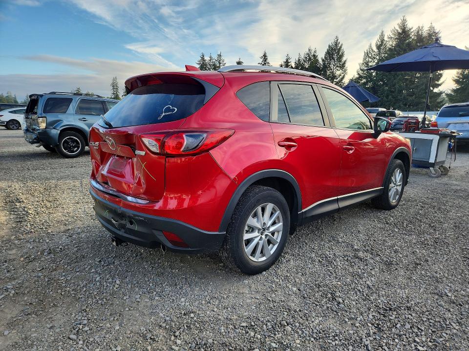 Photo 3 from auction – 2014 MAZDA CX-5 with VIN JM3KE4CY5E0405479