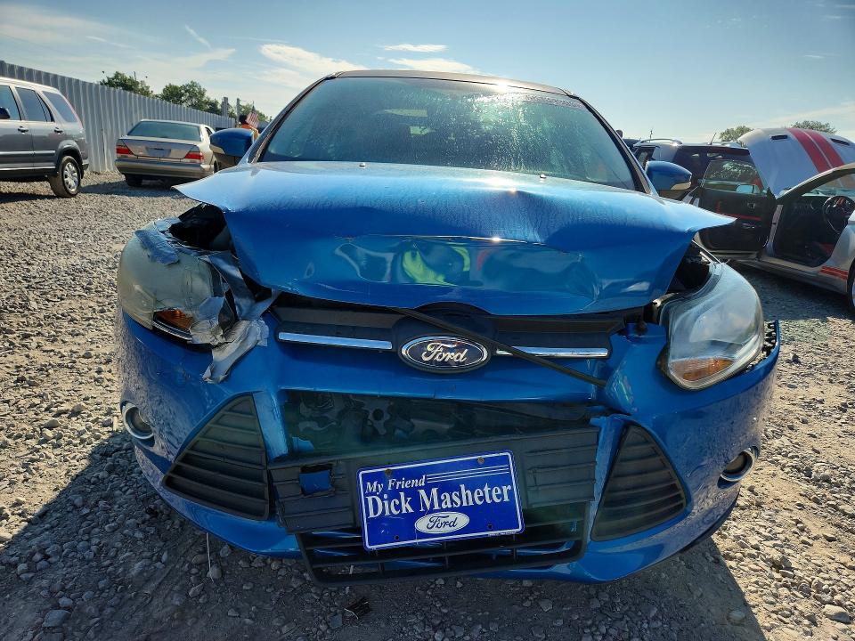 Photo 5 from auction – 2014 FORD FOCUS with VIN 1FADP3F2XEL235539