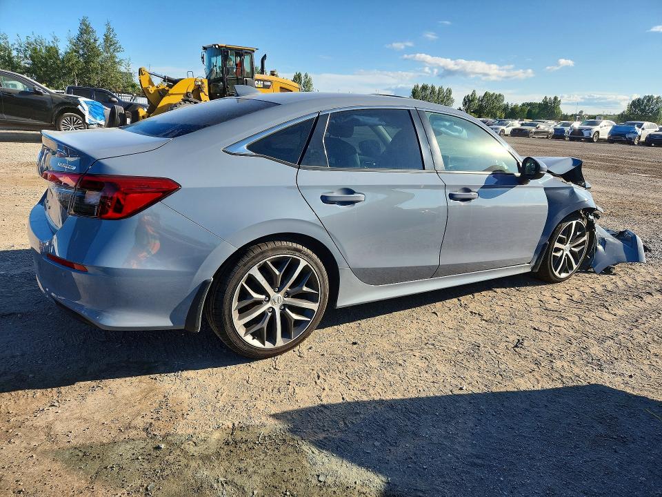 Photo 3 from auction – 2022 HONDA CIVIC with VIN 2HGFE1F99NH000428