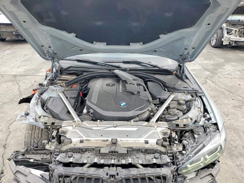 Photo 11 from auction – 2022 BMW M440I with VIN WBA83AP09NCH76154