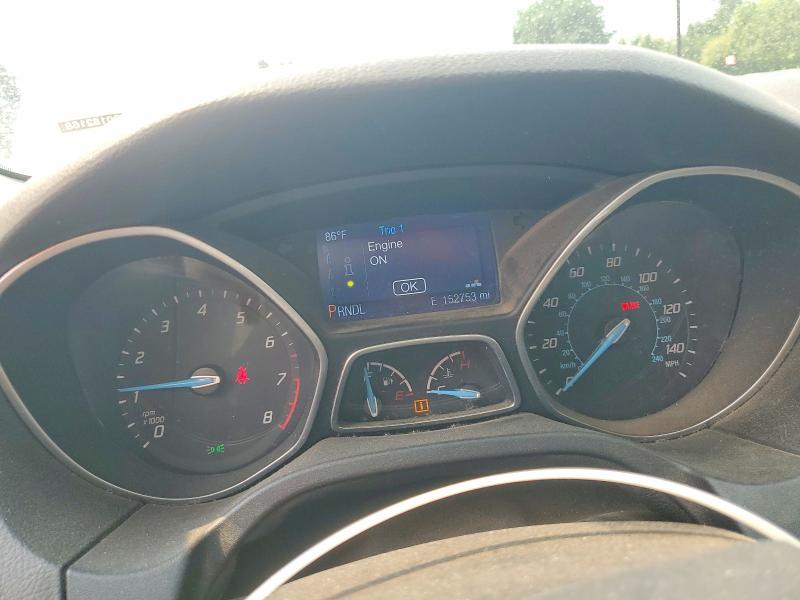 Photo 9 from auction – 2014 FORD FOCUS with VIN 1FADP3K25EL139467