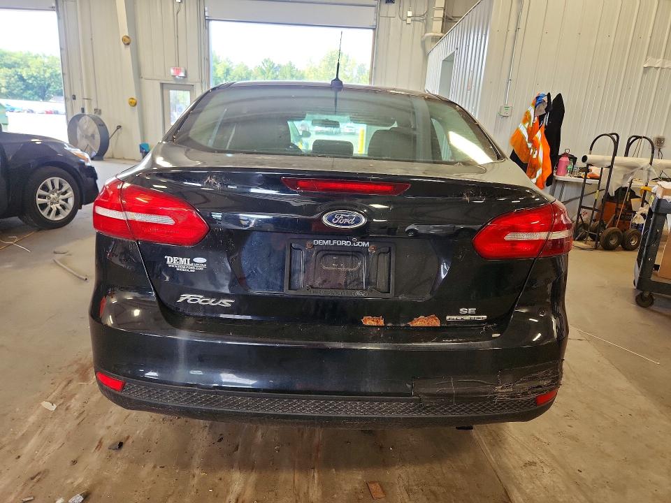 Photo 6 from auction – 2016 FORD FOCUS with VIN 1FADP3F28GL282216