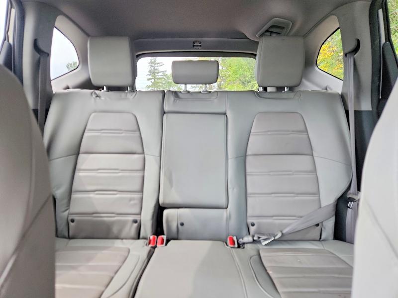 Снимка 10 от търг – 2018 HONDA CR-V с VIN 7FARW2H99JE095590